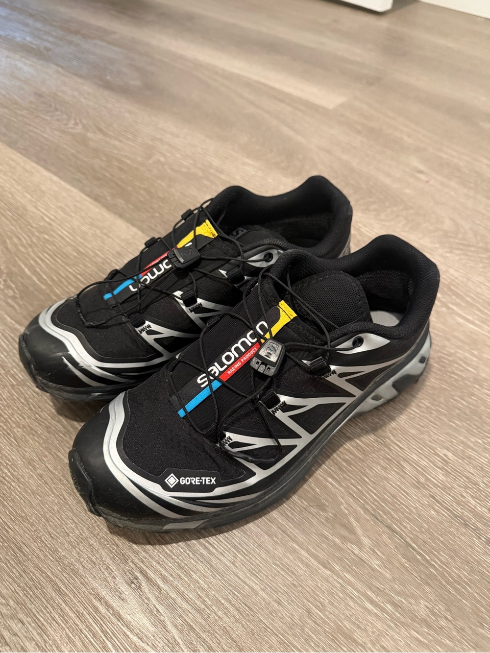 Black and Gray Trail Sneakers with Yellow Accents